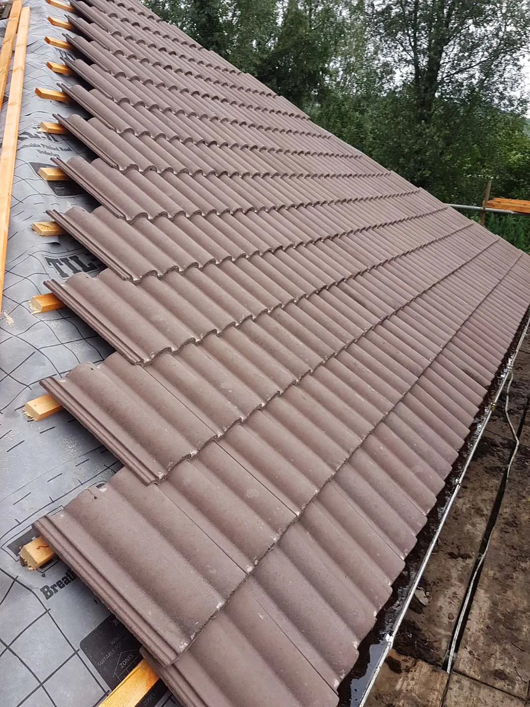 Double Roman tiles laid over breathable membrane and treated battens